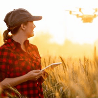 female farmer using tablet in the field