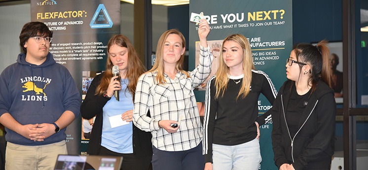group of student presenters at conference
